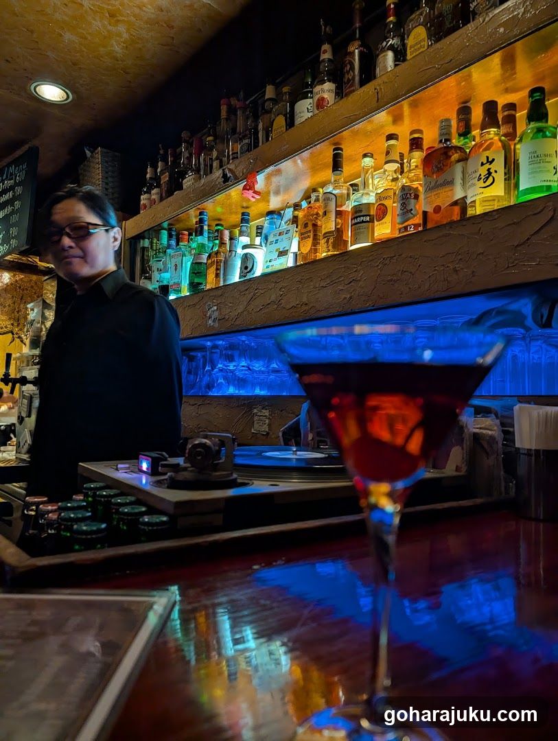 Bar Interior with Bartender and Cocktail