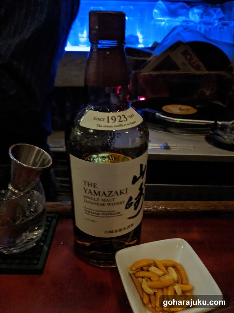 Yamazaki Whisky Bottle and Snacks