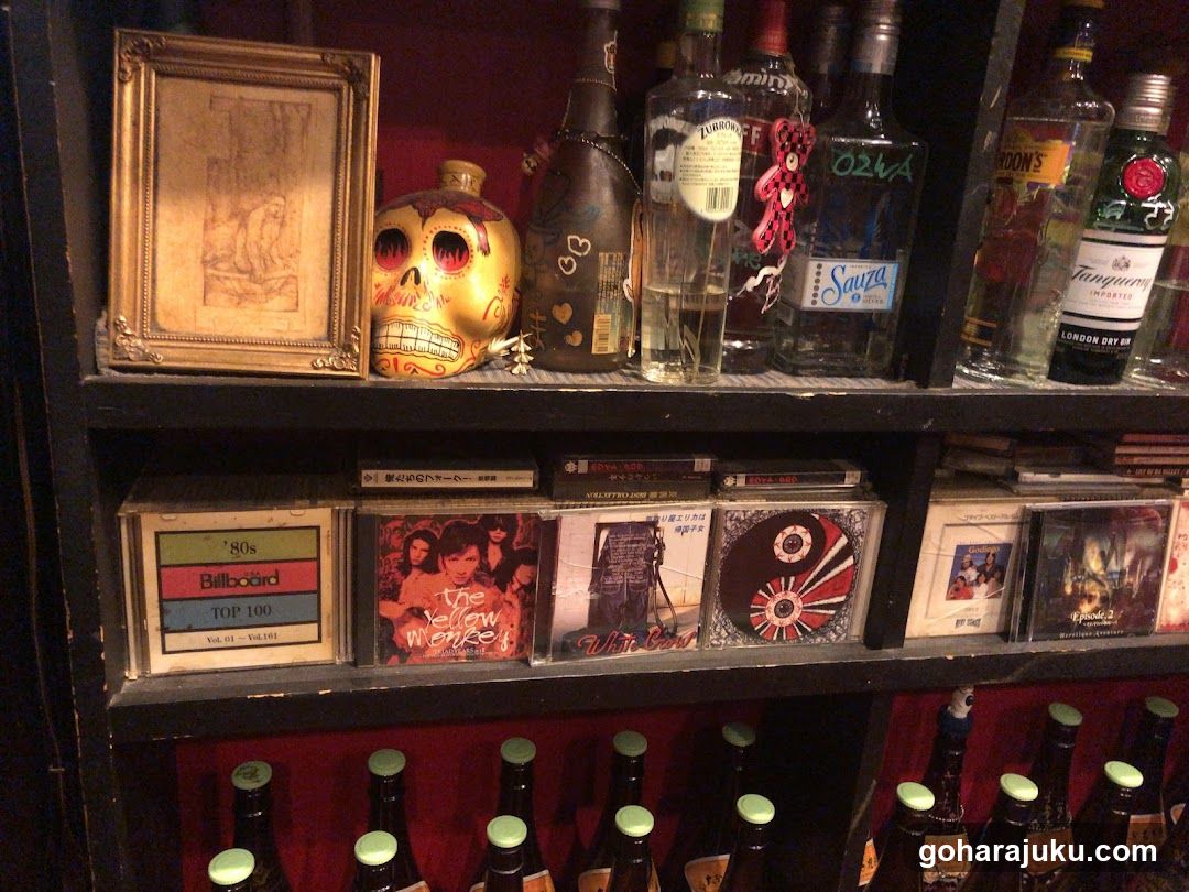 Shelf Display with Bottles and CDs