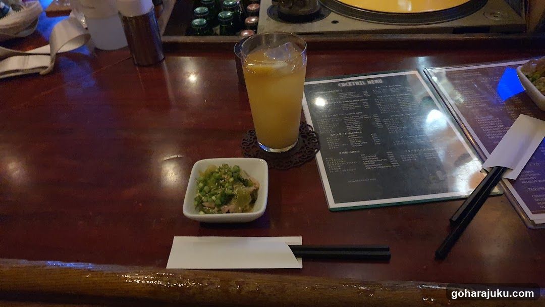 Bar Table Setting with Menu and Drink