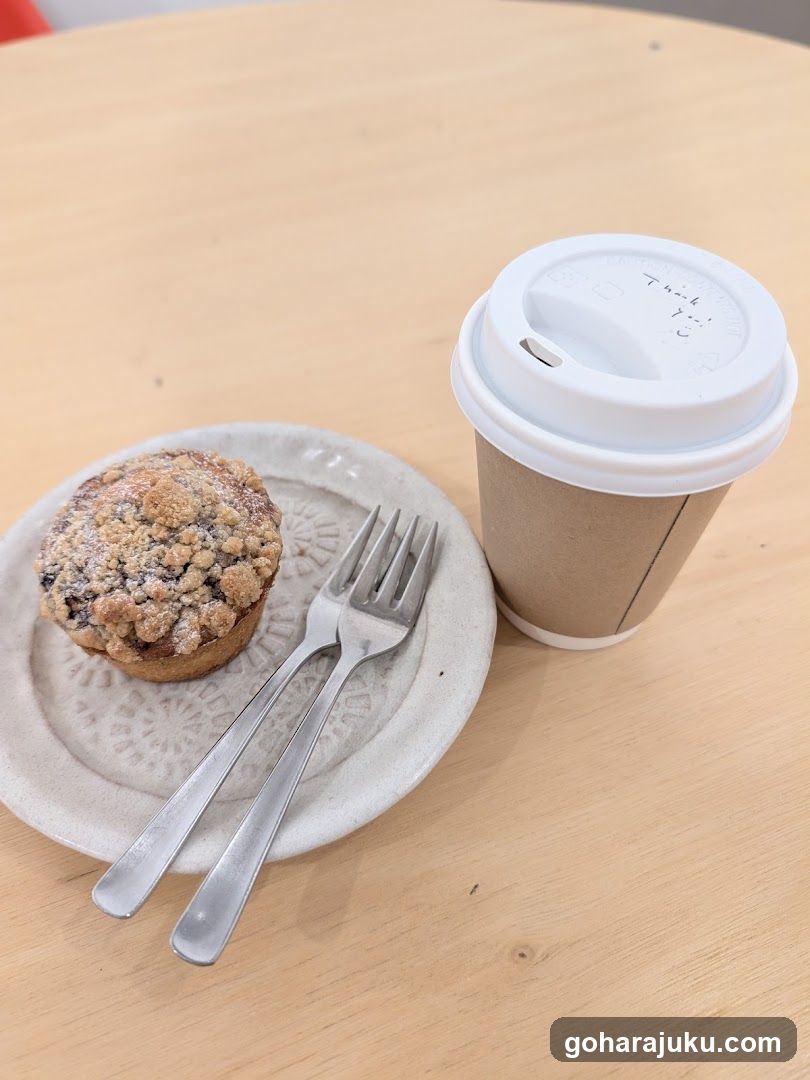 Coffee and Muffin on Wooden Table