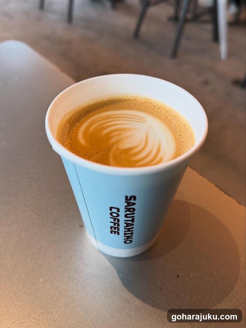 Latte in Sarutahiko Coffee Cup