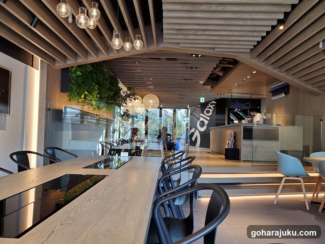 Modern Cafe Interior with Wooden Ceiling and Hanging Lights