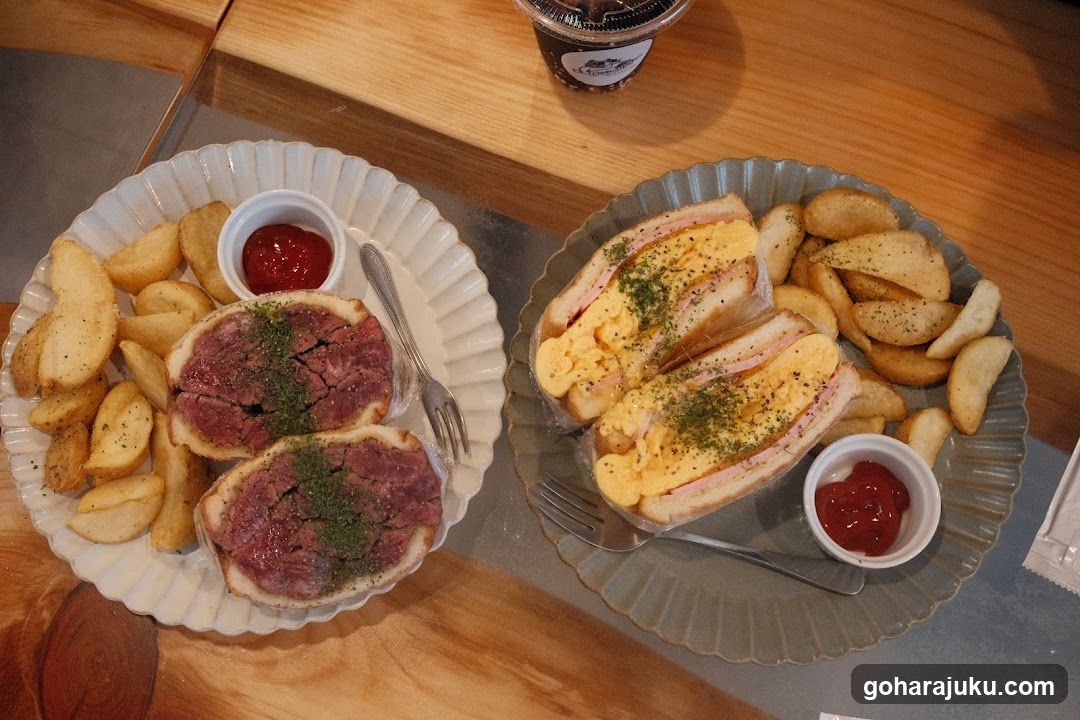 Food Spread with Steak and Sandwiches