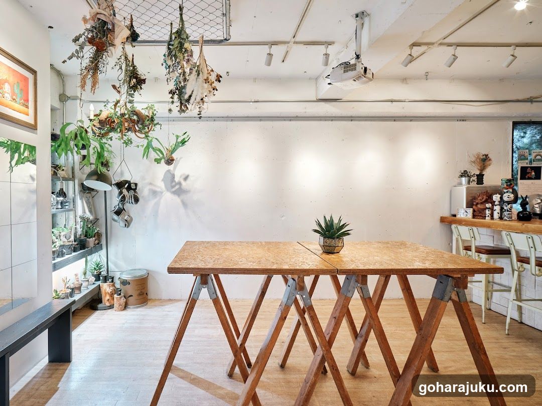 Interior of a plant-filled cafe or shop