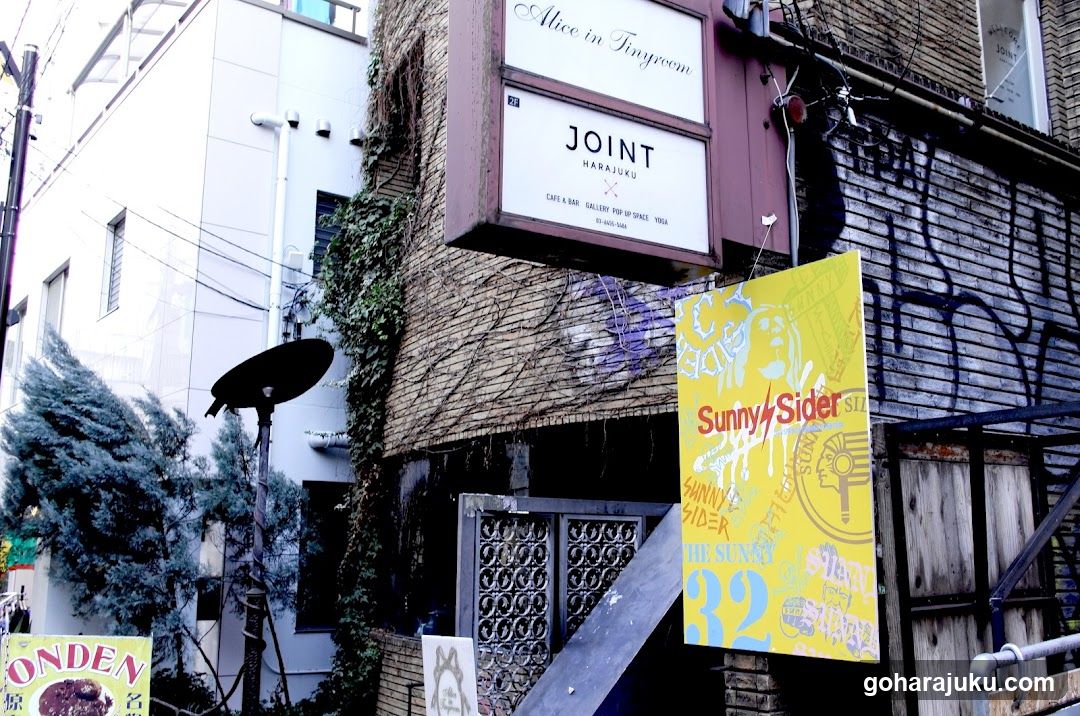 Street Scene with Shop Signs and Graffiti