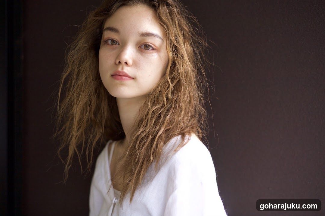 Portrait of a young woman with wet hair