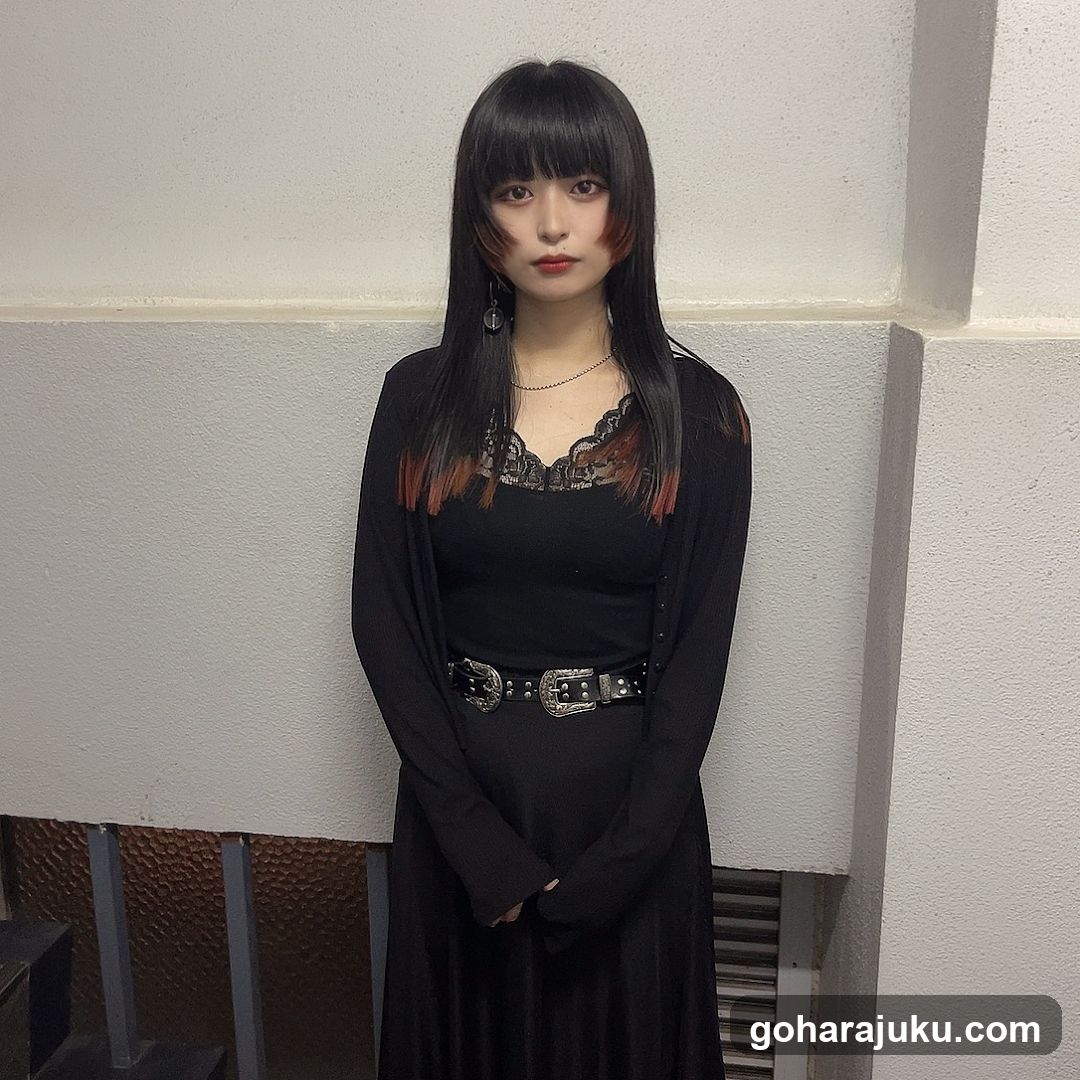 Portrait of a woman in black attire