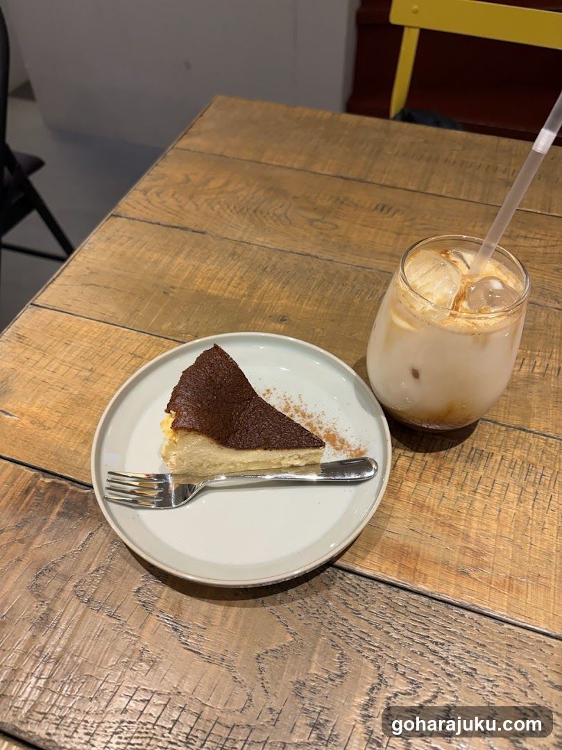 Cheesecake and Iced Coffee on Wooden Table
