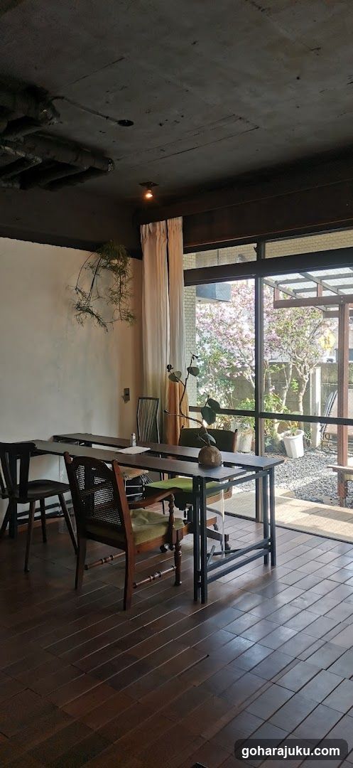Interior of a cafe or restaurant with wooden tables and chairs