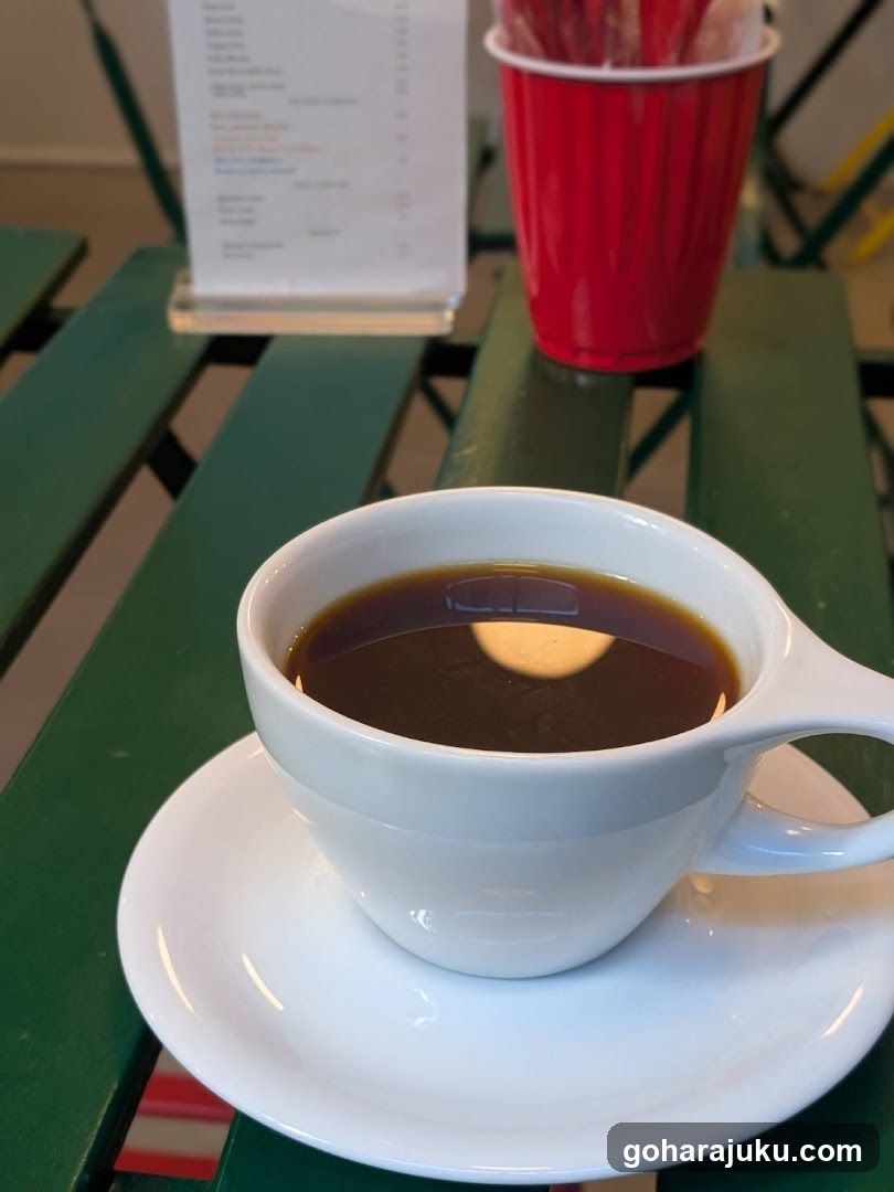 Coffee Cup on Green Table