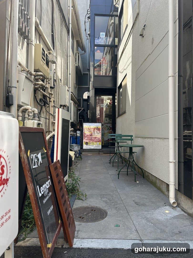 Alleyway with Shop Signage and Outdoor Seating