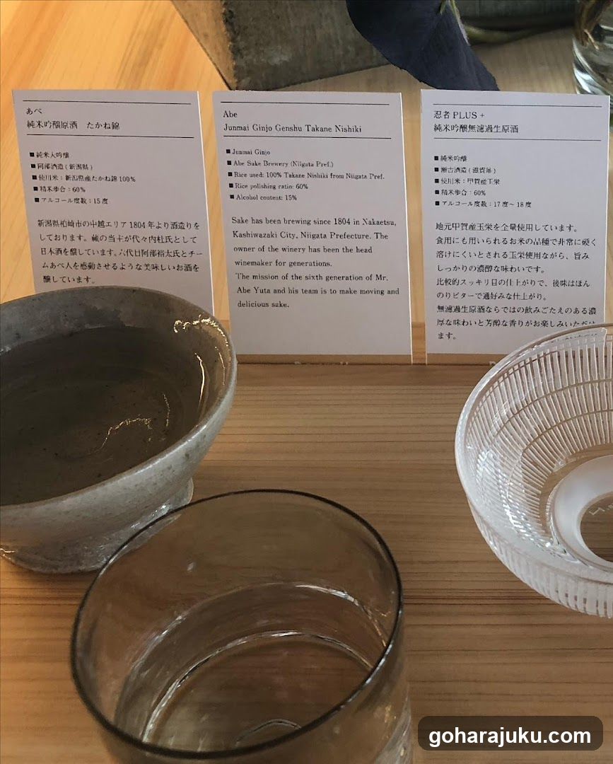 Sake tasting setup with informational cards