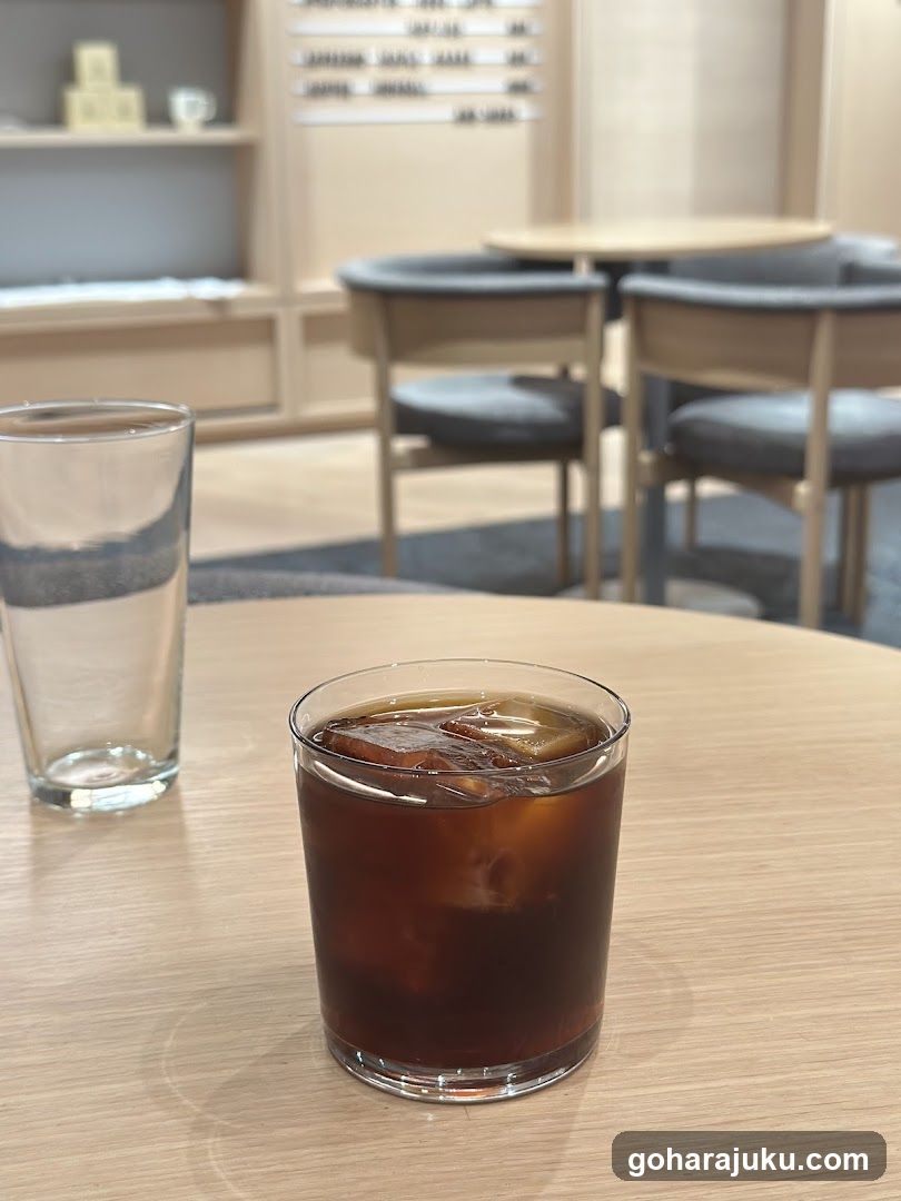 Iced Coffee and Water on a Table