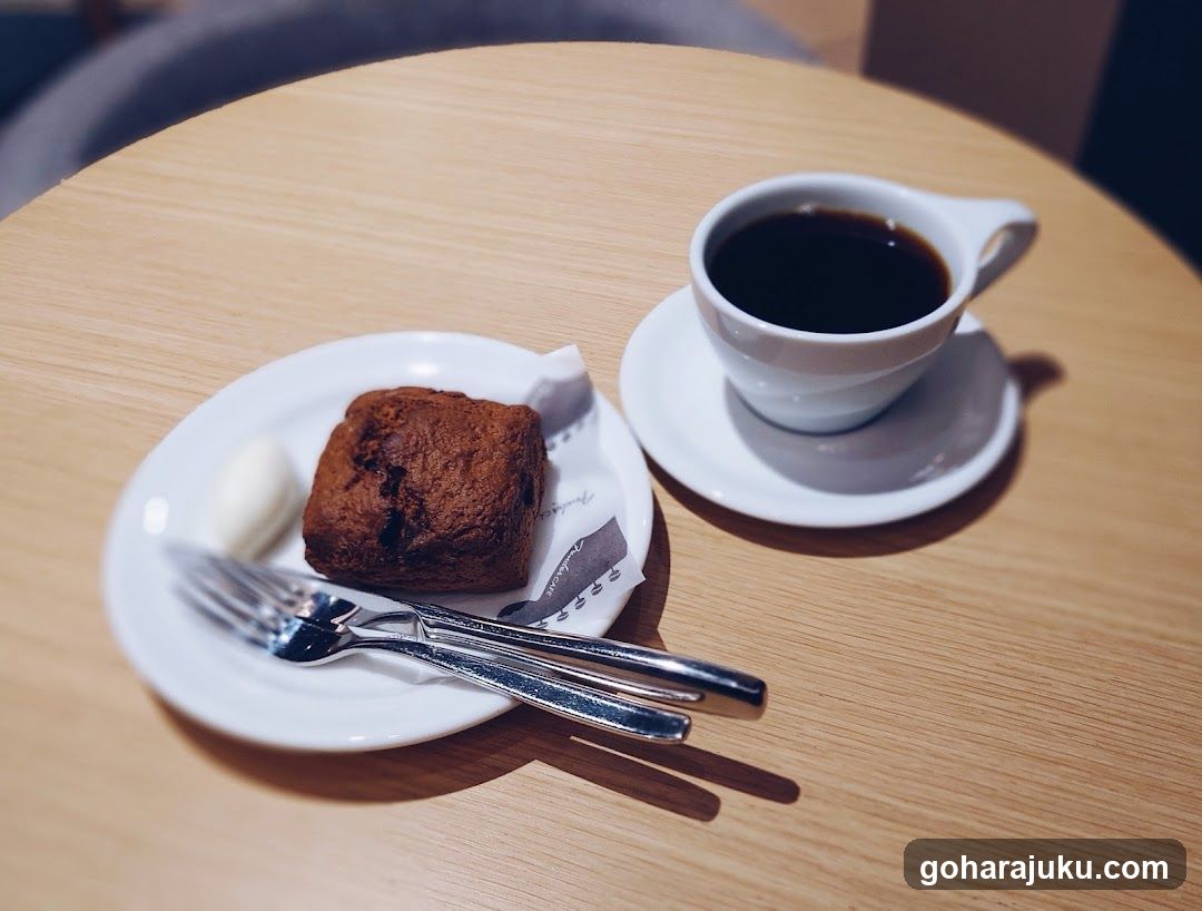 Coffee and Pastry on Wooden Table