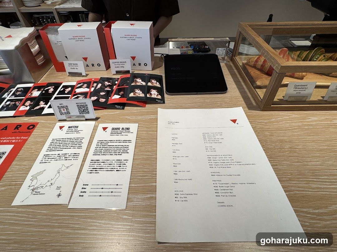Product display table with menus and merchandise