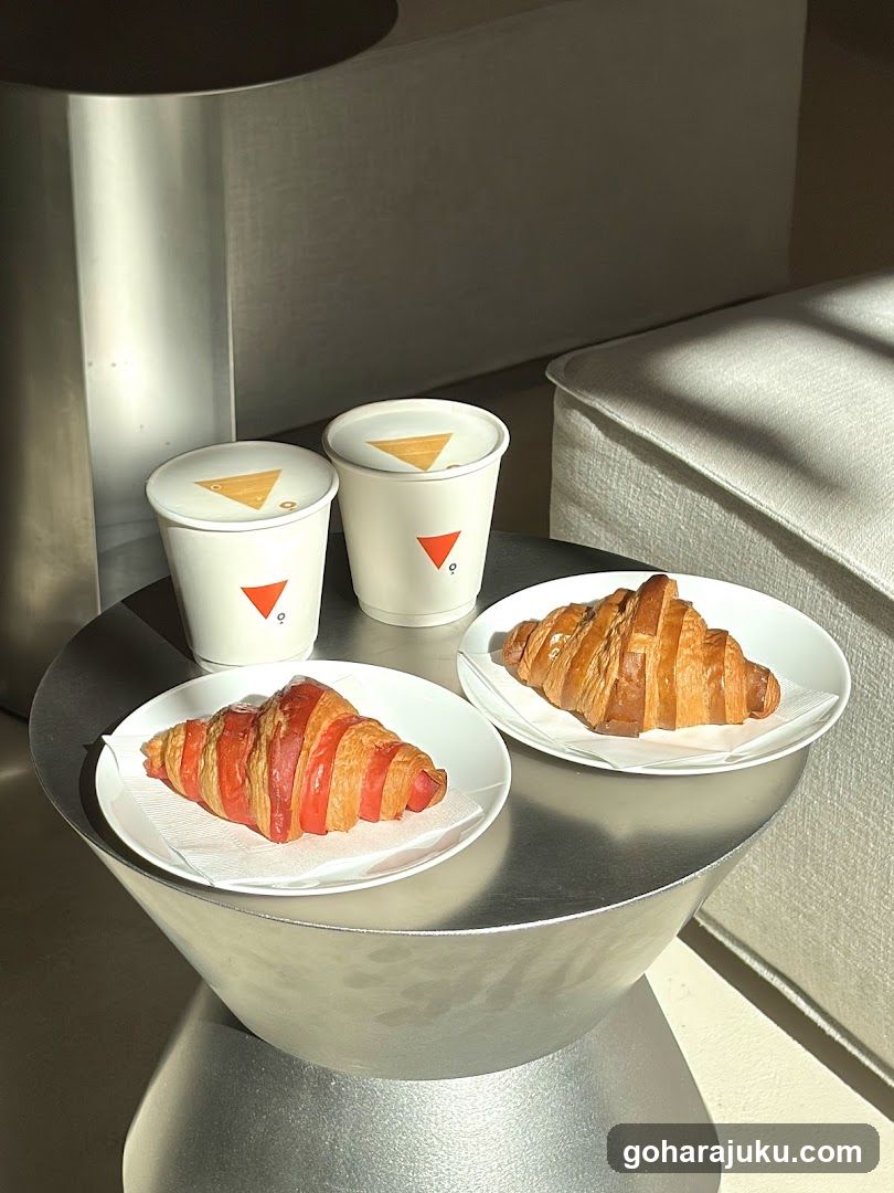 Croissants and Coffee Cups on a Side Table