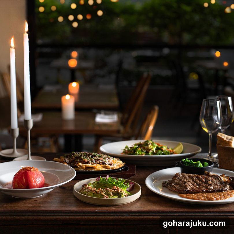 Dining Table with Candles and Plated Food