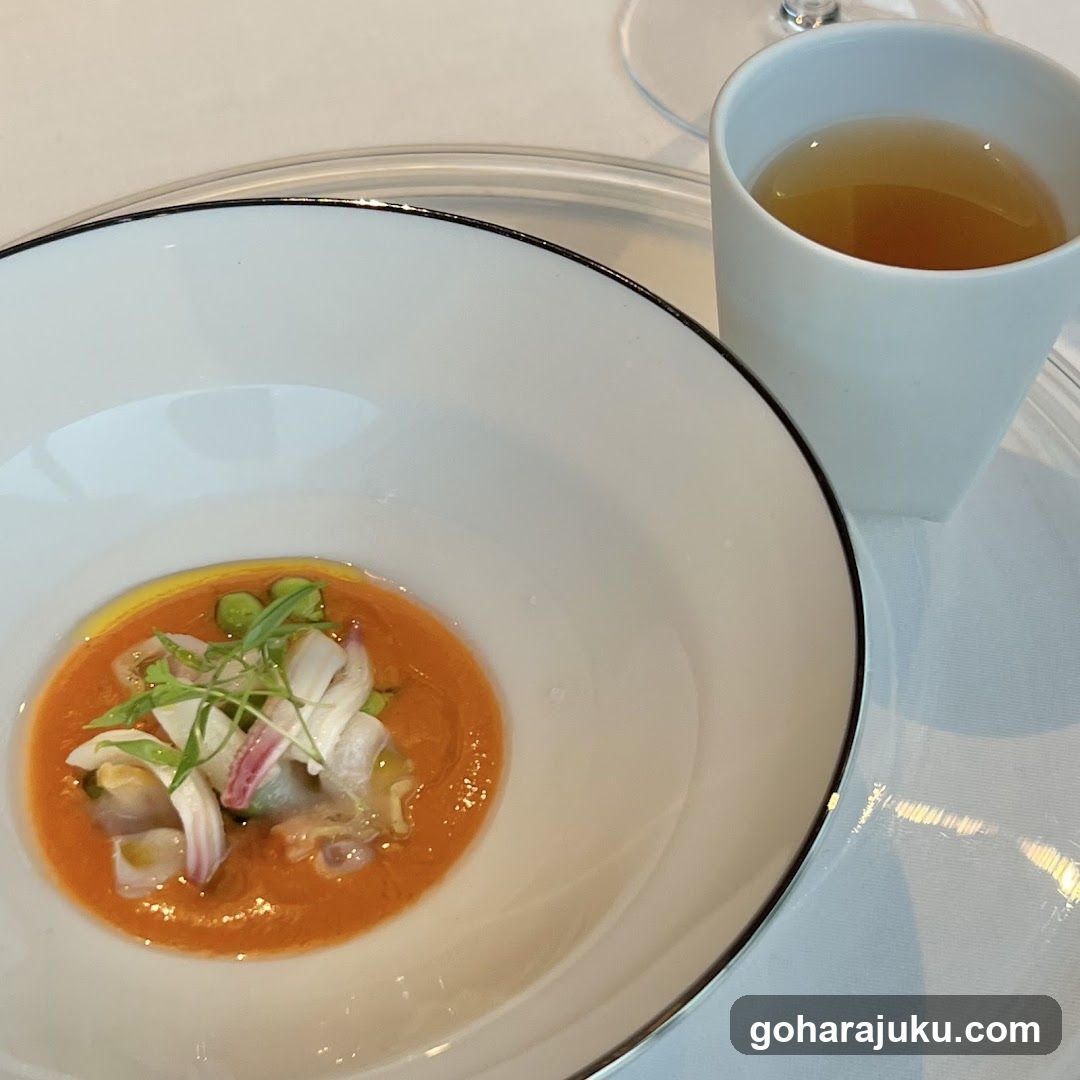 Soup with garnish and tea