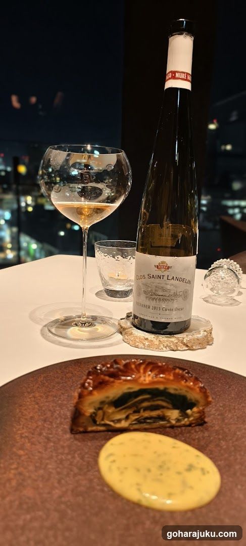 Dining Scene with Wine and Pastry