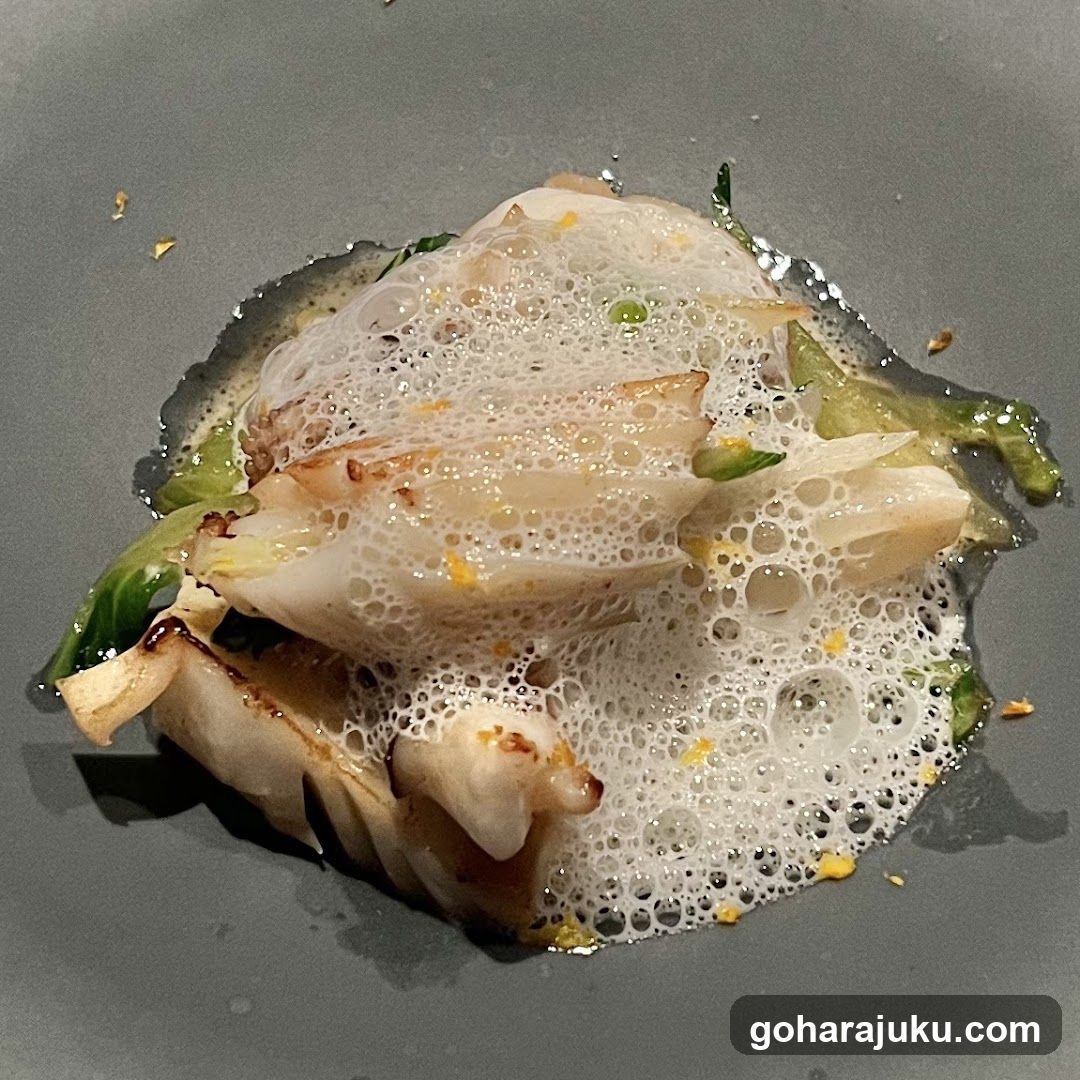 Foam-topped seafood dish