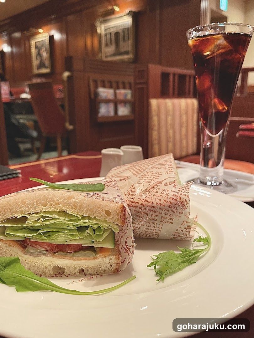 Sandwich and Drink in Restaurant Interior
