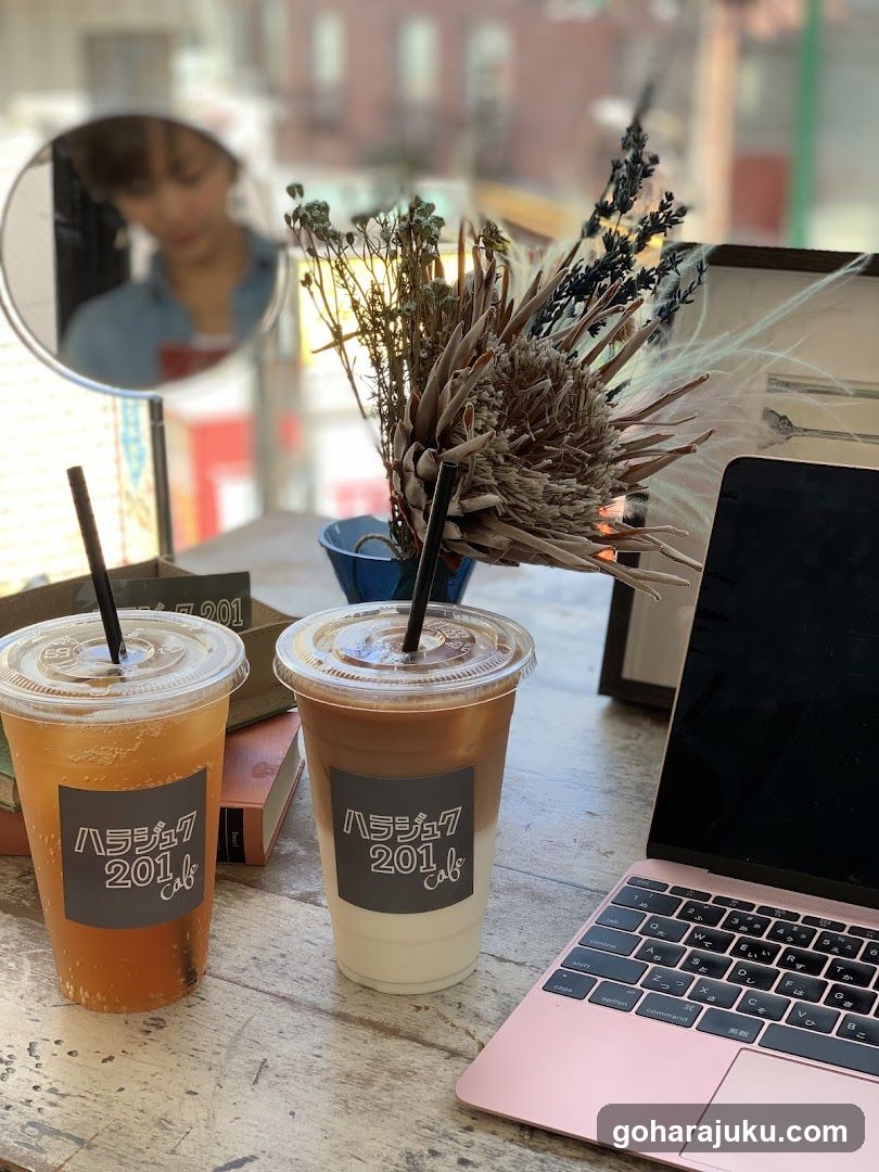 Cafe Interior with Drinks and Laptop