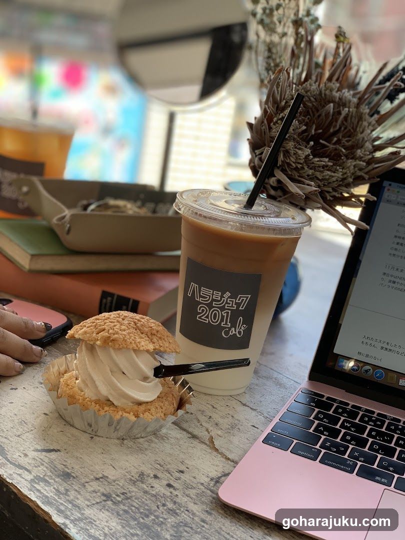 Cafe Interior with Dessert and Laptop