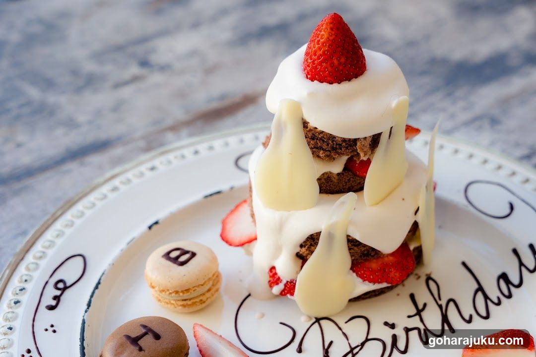 Birthday Cake with Strawberries and Macarons
