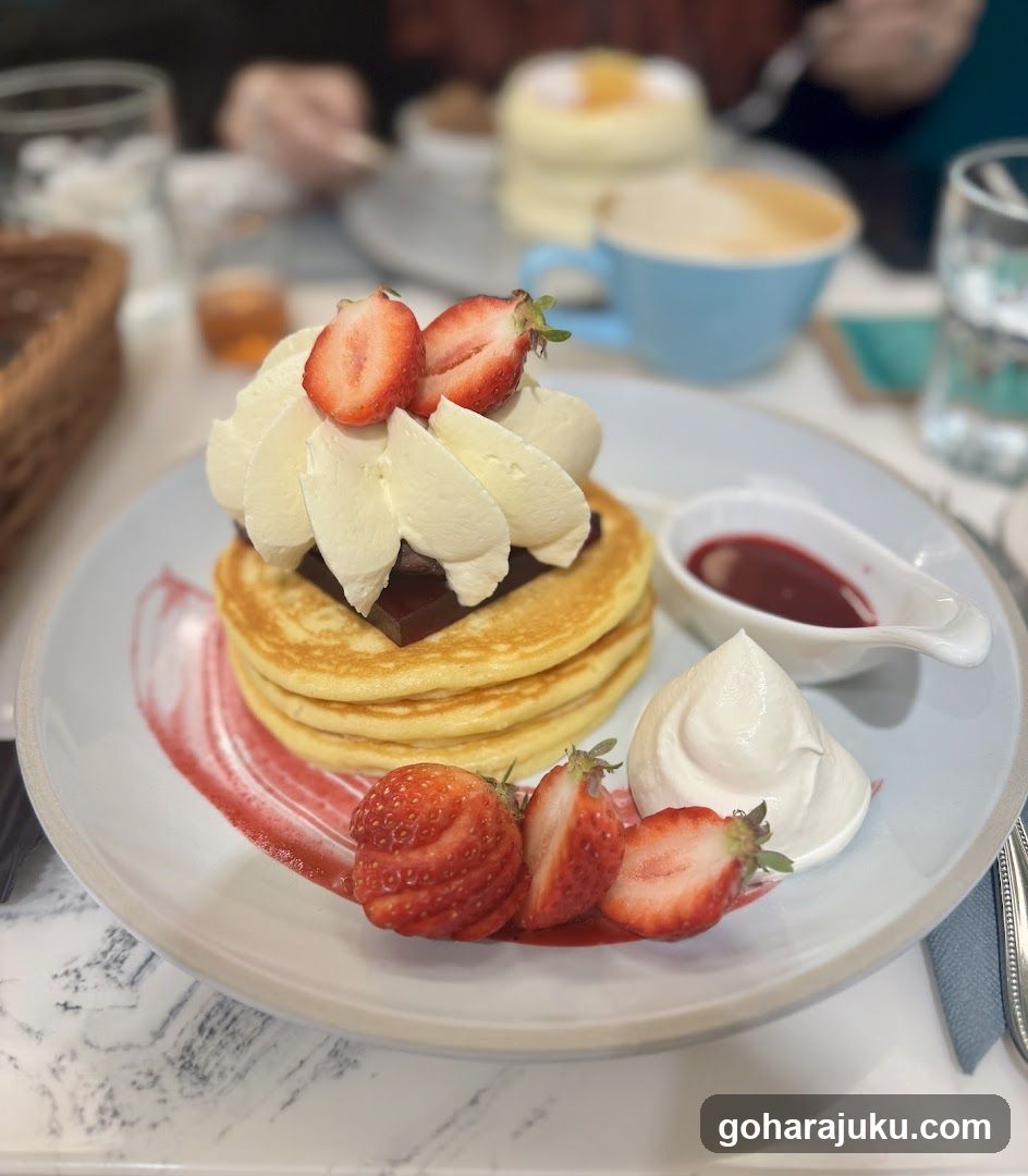 Strawberry Pancakes with Whipped Cream and Jam