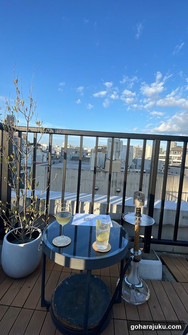 Rooftop Terrace with Drinks and Hookah
