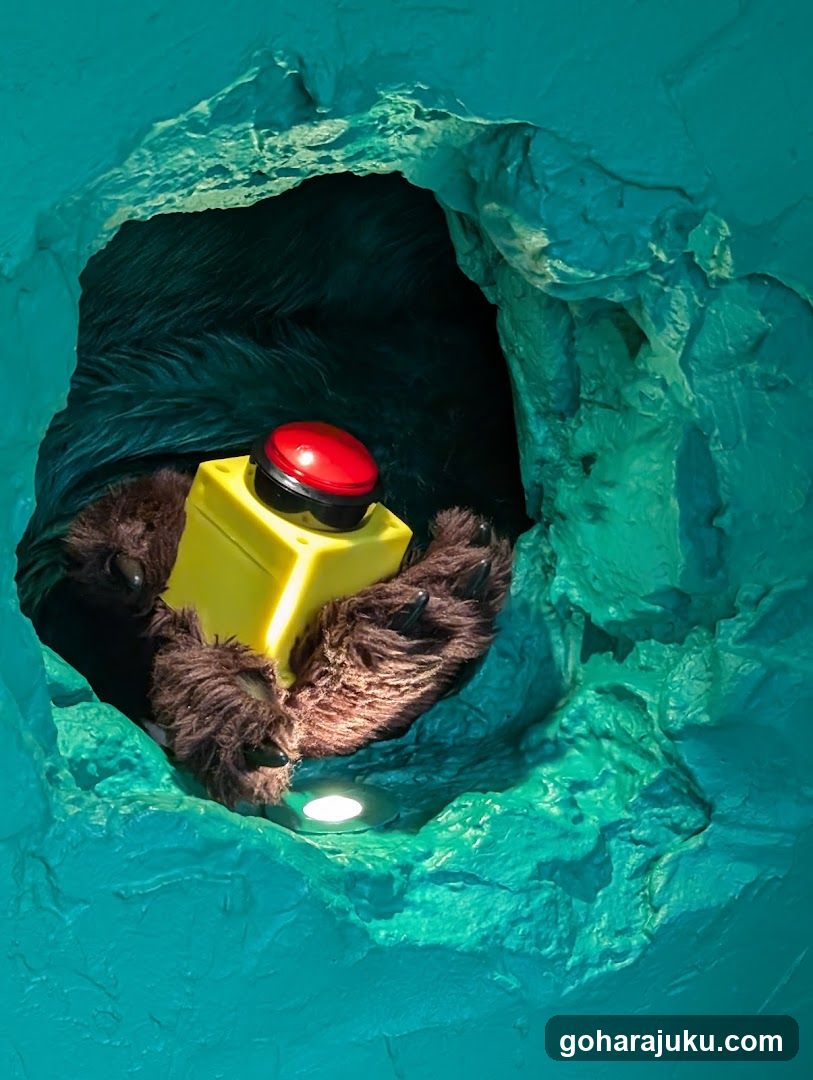 Bear with Red Button in Cave