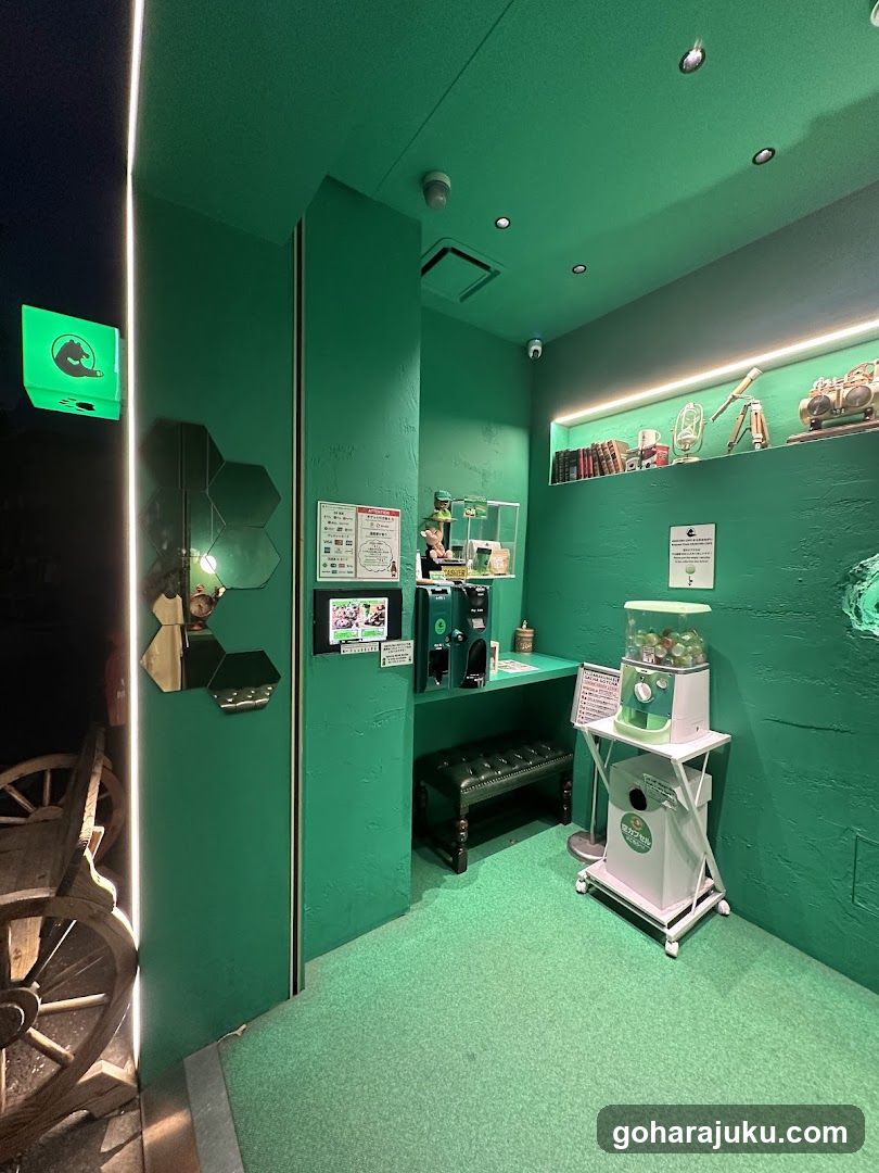 Green themed interior with gumball machine and coffee station