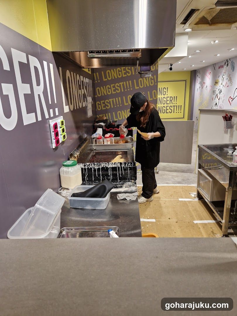 Kitchen Interior with Staff Cooking