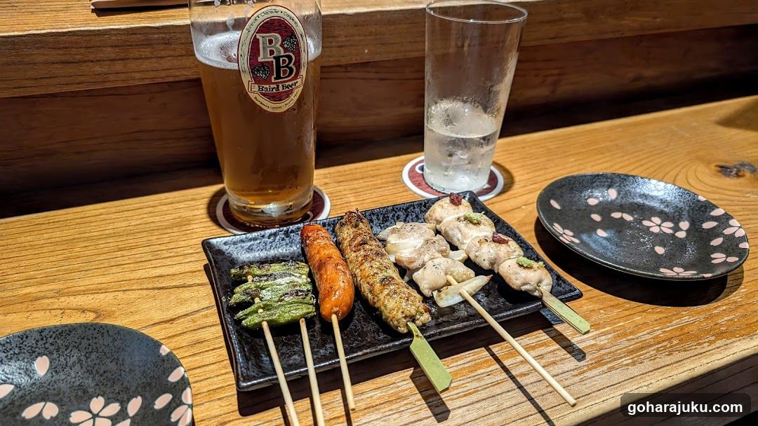 Yakitori and Beer on Wooden Table