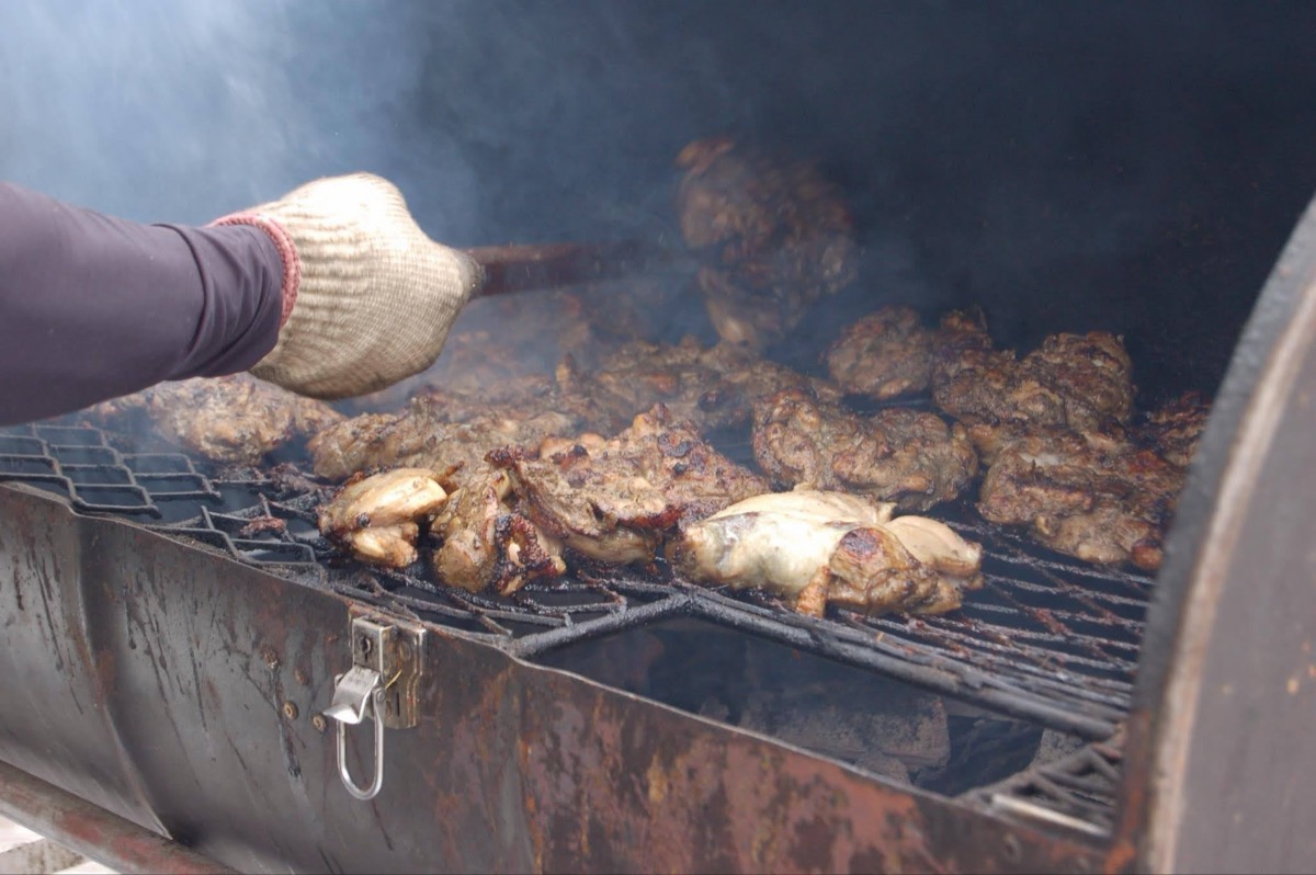 Jerk chicken cooked in a drum at the Yoyogi Caribbean festival