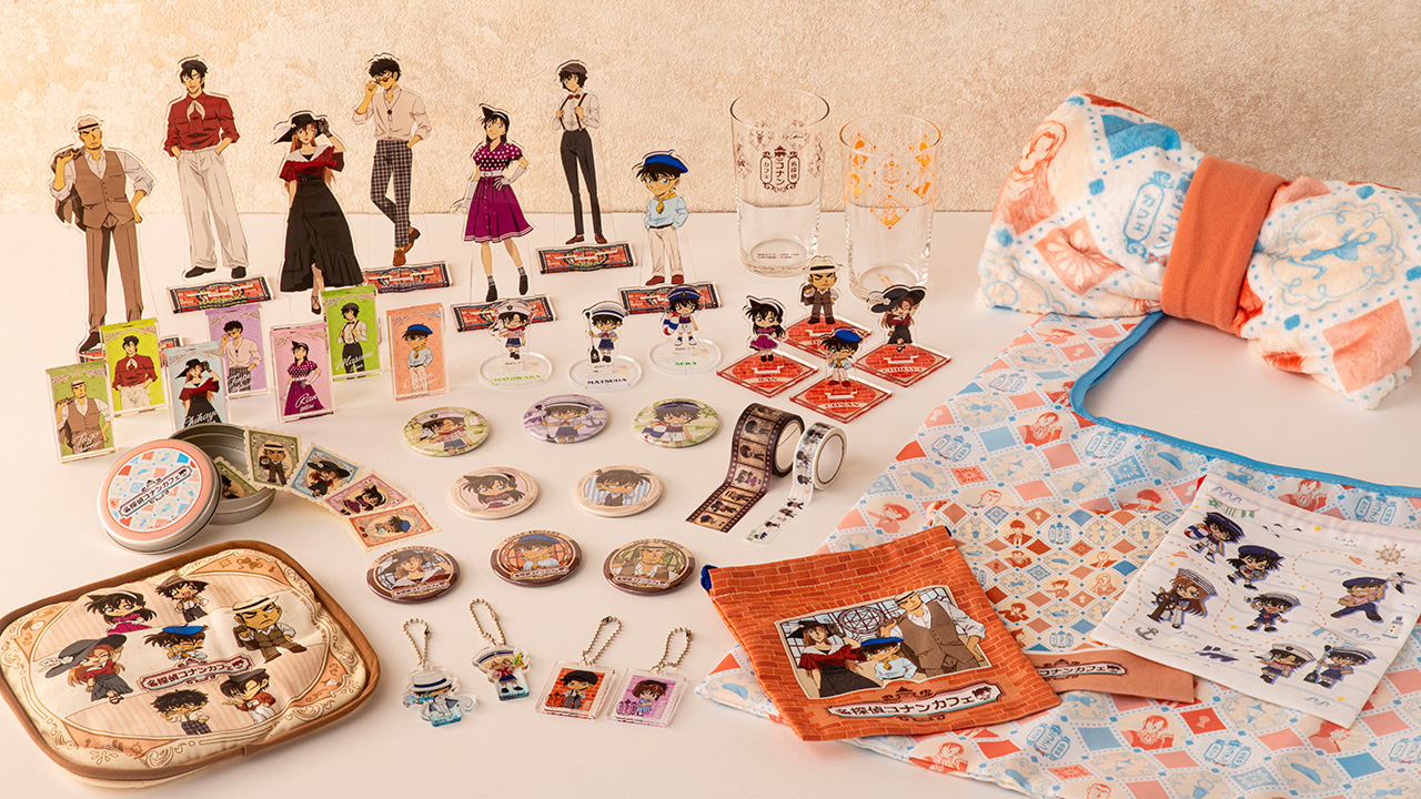 Detective Conan Cafe 2026 merchandise including acrylic stands, badges, and cookie tin at Q Plaza Harajuku